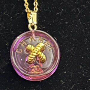 Purple & Gold Chanel upcycled button Logo Pendant.